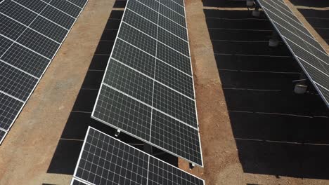 the side view of solar power panels absorb sun rays in solar farm.4k video
