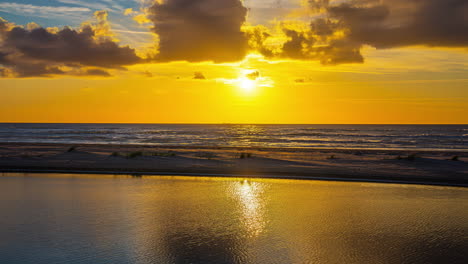 stunning sunset over calm ocean beach