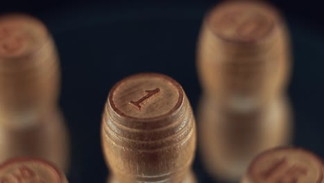 close-up of wooden barrels with number one