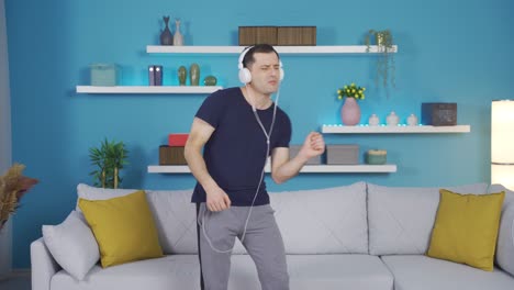 the man who started dancing and making funny moves after playing live music on his phone.