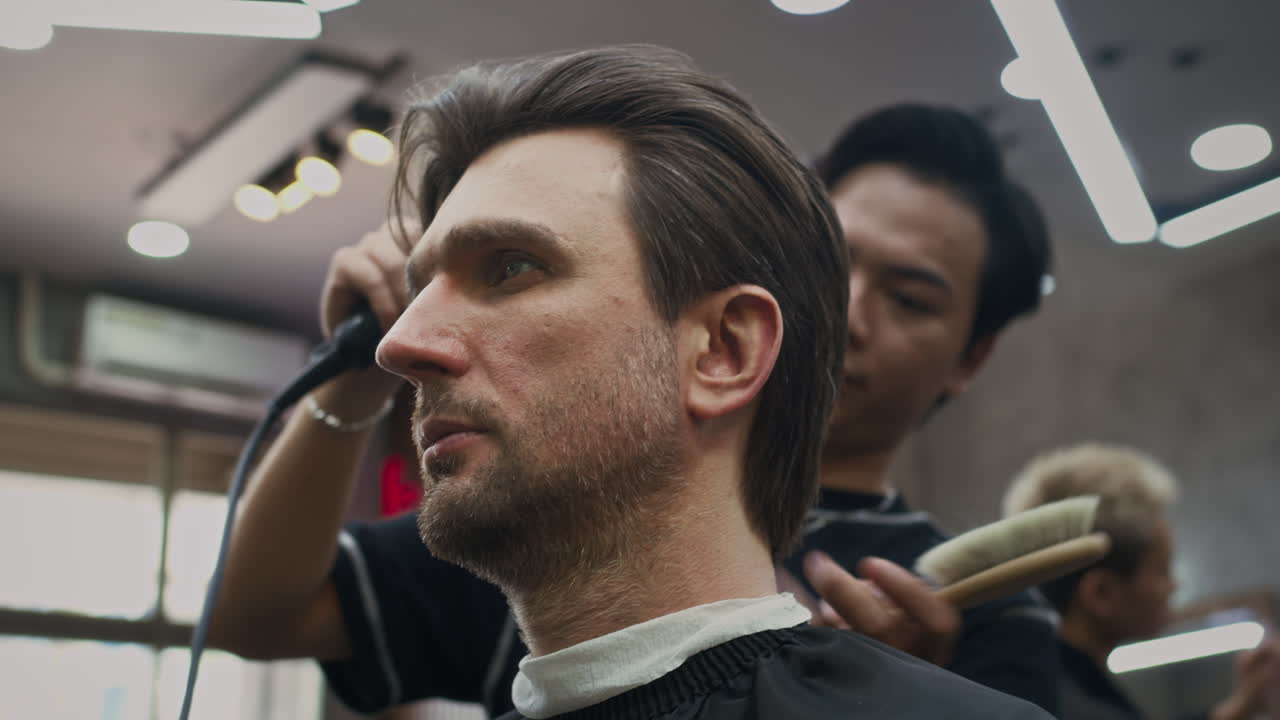 Man getting a haircut in a barber shop