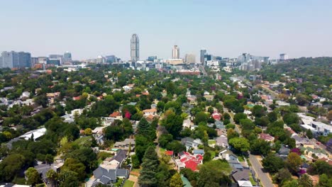 Parkmore-Sandton---A-beautiful-reverse-reveal-shot-of-the-city-of-Sandton,-Johannesburg,-South-Africa