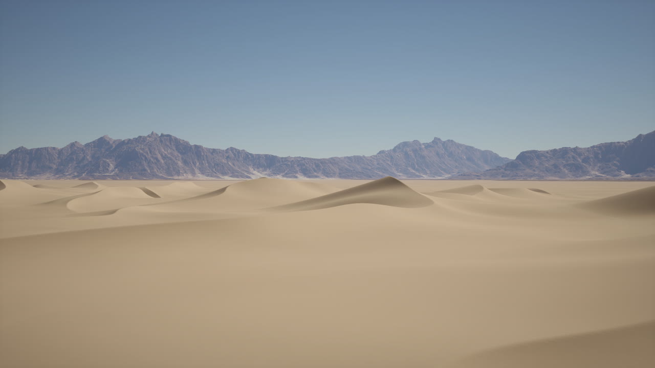 배경 에 산 들 이 있는 사막 의 모래 언덕