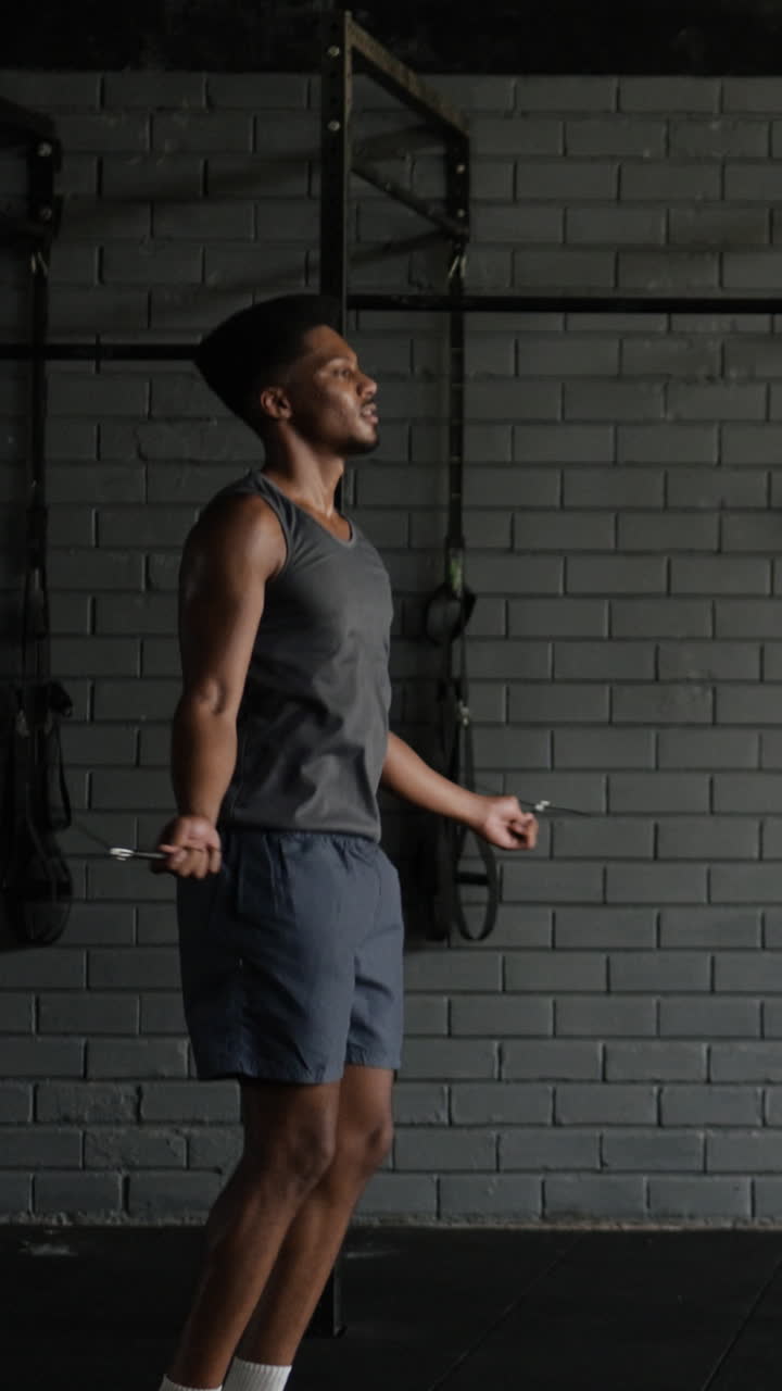 Man Jumping Rope in Gym