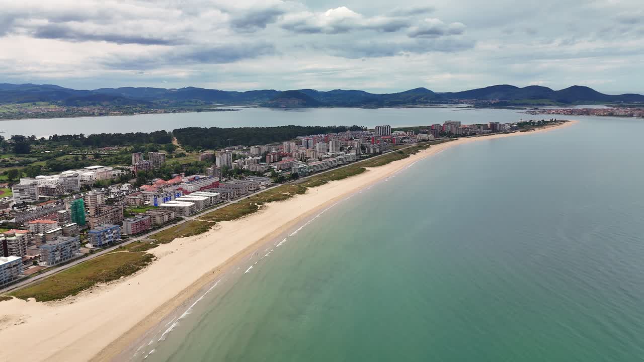 Incredible coastline in Spain with mountains in the background (drone footage)