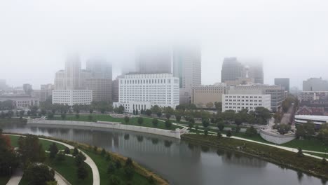 Columbus-Ohio-skyline-on-a-foggy-morning,-aerial-drone