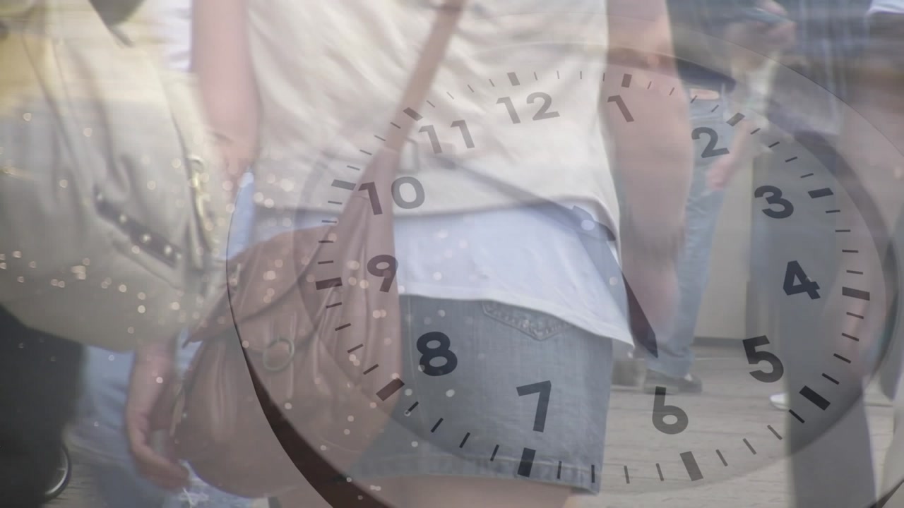 Animation of clock with periodic motion over midsection of people walking on streets and gift shop