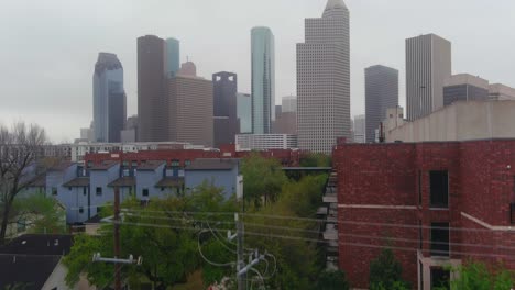 aerial view of houston cityscape on a rainy and gloomy day