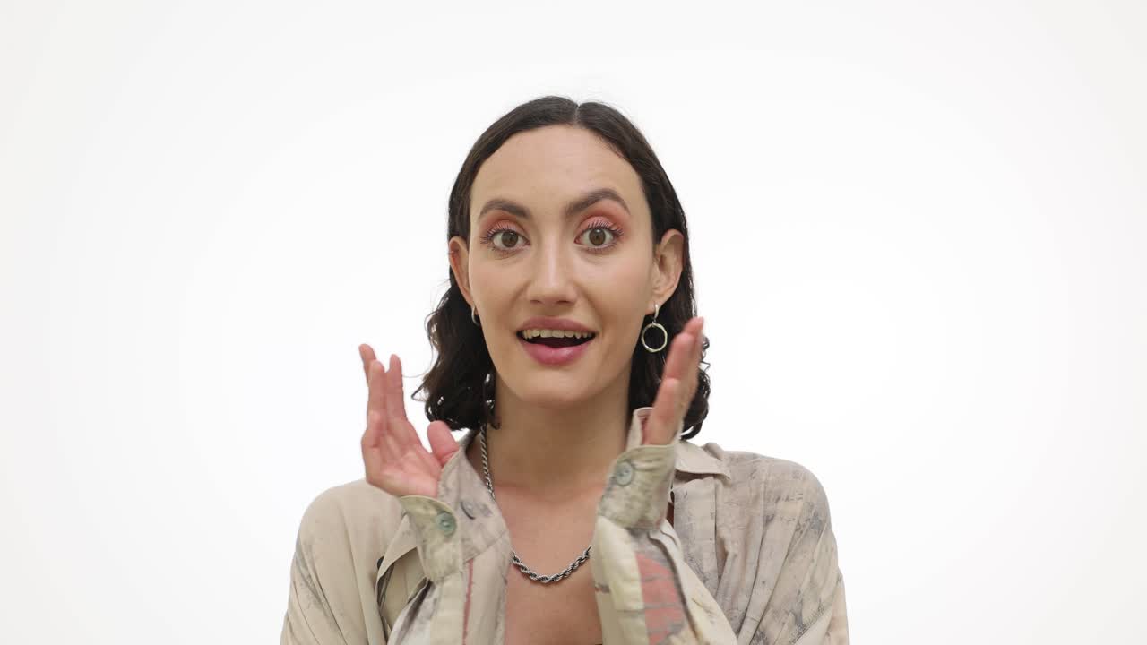 Woman showing various expressions of surprise and delight