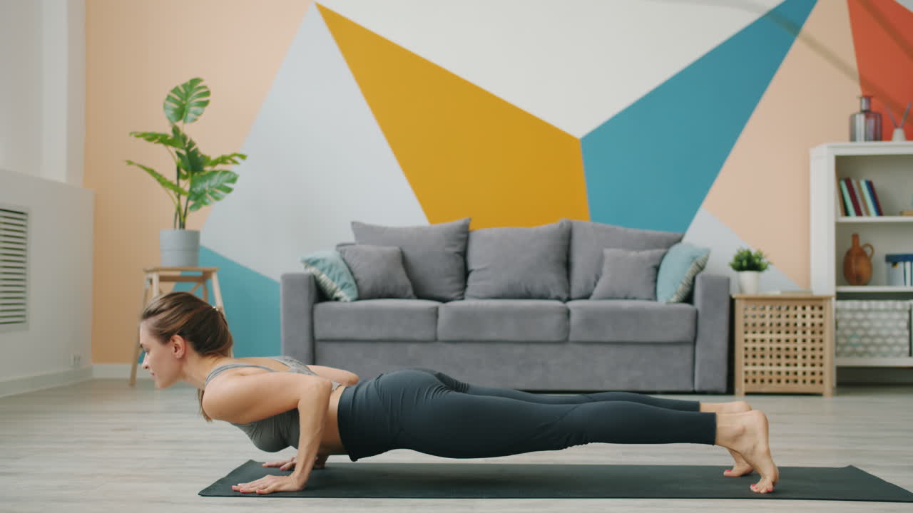 Yoga poses in a living room