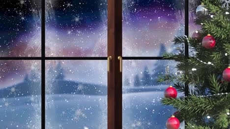 Animation-of-window-and-christmas-tree-over-snow-falling-and-winter-landscape