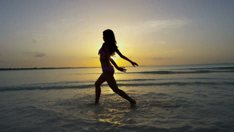 young asian chinese girl in swimwear on beach