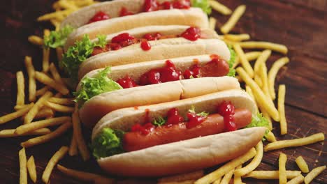 american hot dogs assorted in row  served with french fries