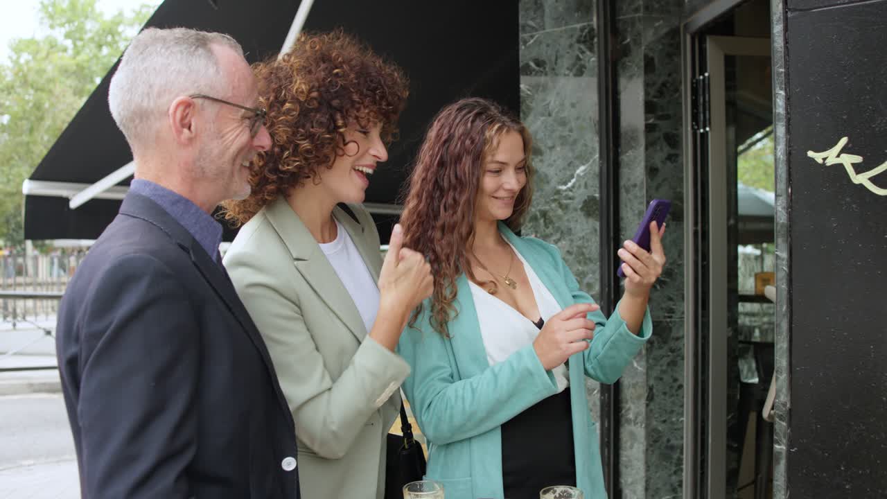 People taking a selfie outdoors