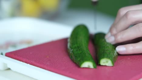 Chopping-cucumber-close-up