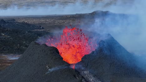 Litli-Hrutur-volcano-eruption-with-hot-molten-lava-exploding-from-crater,-Iceland-2023