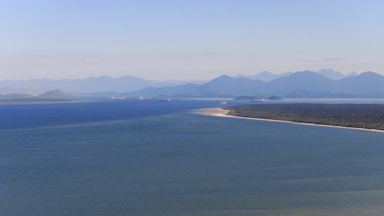 Coastal aerial view of Paranagua bay and spectacular distant mountain ridges, Paraná, Brazil