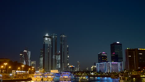 night city skyline with river boats