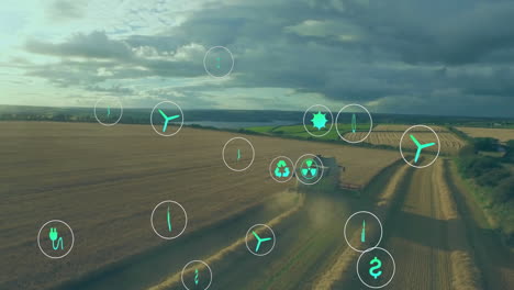 icons representing renewable energy sources animation over aerial view of farmland