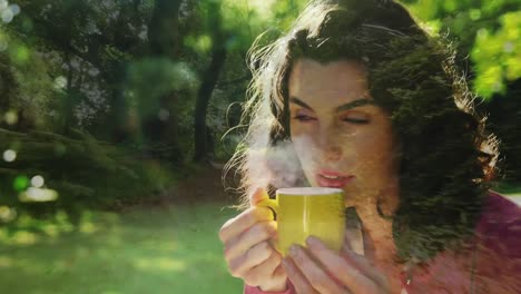 Woman-drinking-coffee-outdoors
