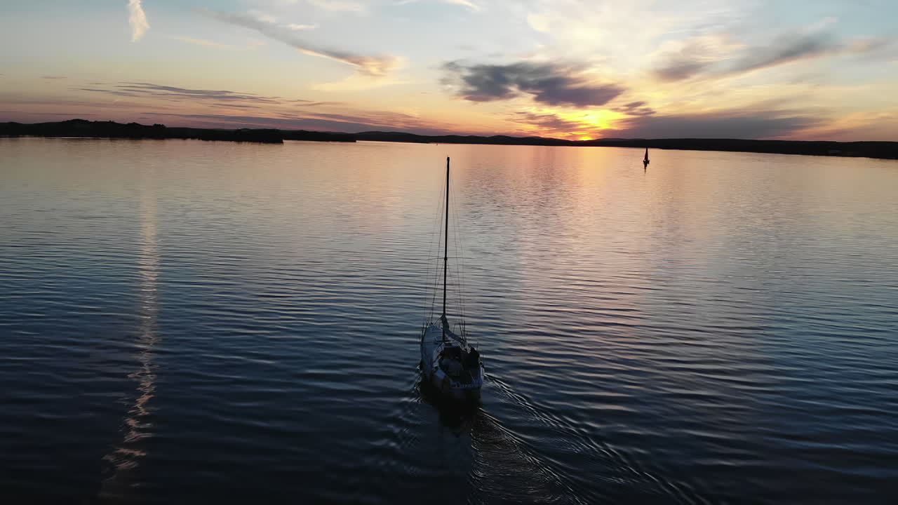 Sailboat on the Lake at Sunset