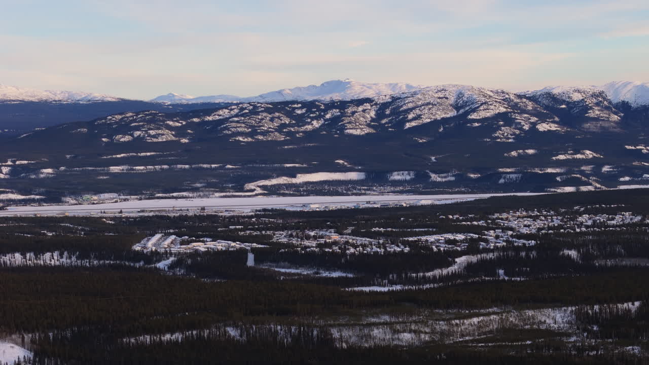 Witness the frozen landscapes of Fish Lake surrounding downtown Whitehorse in Yukon. A stunning combination of urban and winter wilderness in Canada’s north.