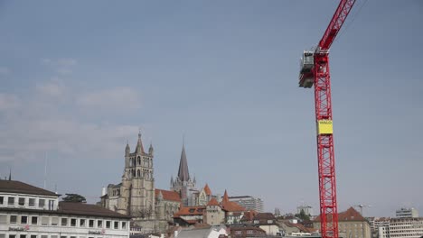 construction crane with lausanne cathedral