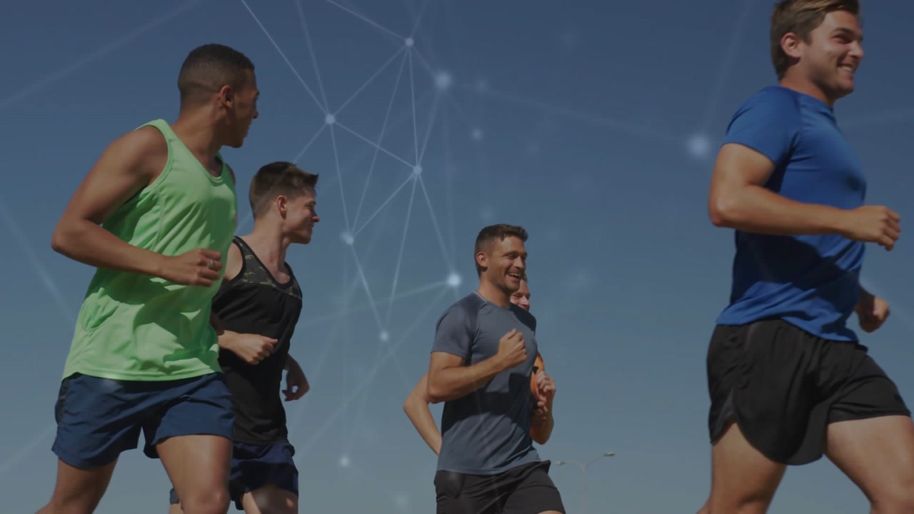 Men jogging leftward for fitness training, camera panning, geometric overlay across sky above group
