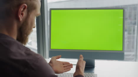 Student-talking-mockup-device-online-indoors-closeup.-Man-using-chroma-key-pc