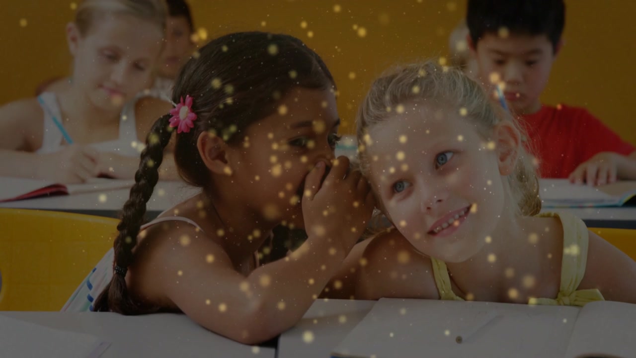 Dark haired girl whispering secret to classmate in school, creating friendship with golden sparkles