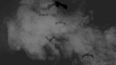 murciélagos por la noche con humo