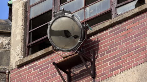 Prison-searchlight-mounted-to-abandoned-guardhouse-at-Eastern-State-Penitentiary