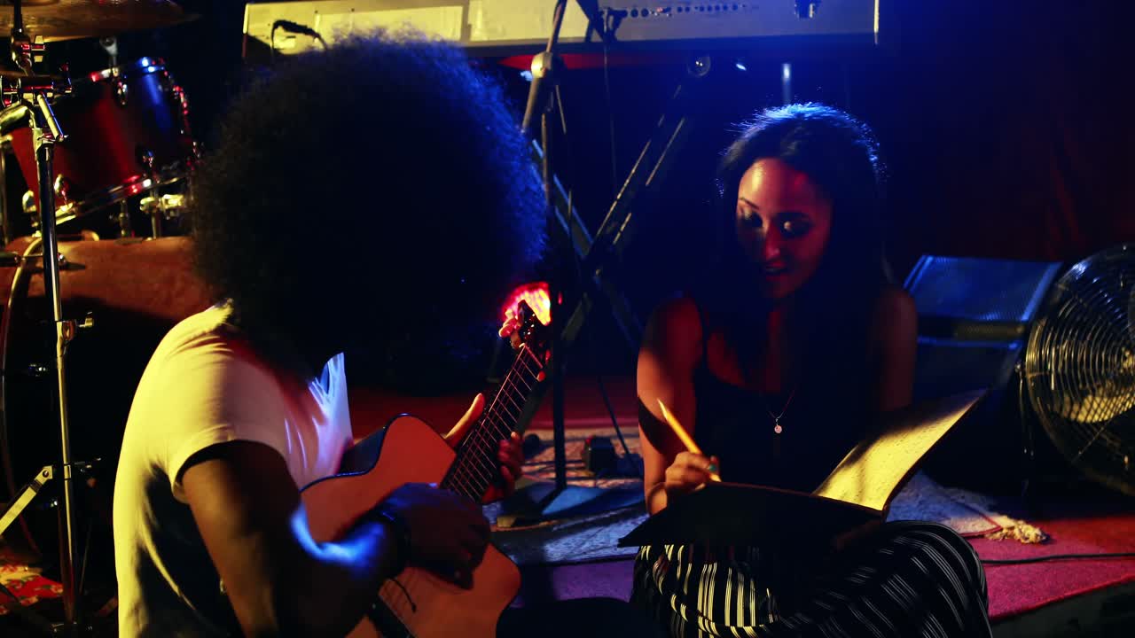 Couple rehearsing music on concert 4k