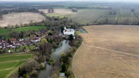 landscapes drones fly over ponds and a small village