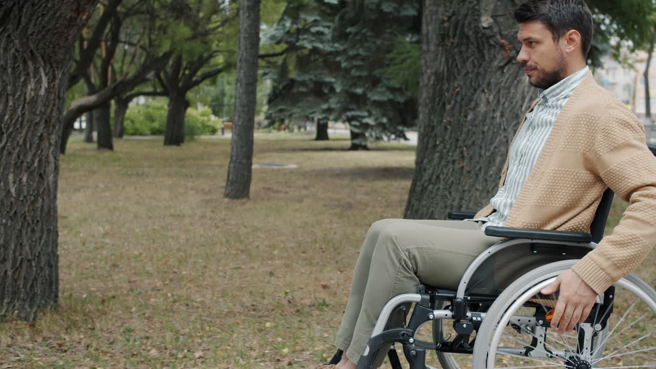 Man in Wheelchair in a Park