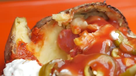 stuffed baked potato with toppings