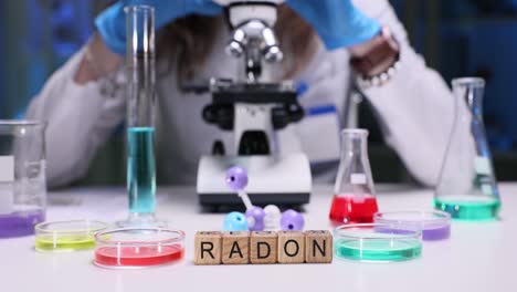 scientist studying radon gas in a chemistry laboratory