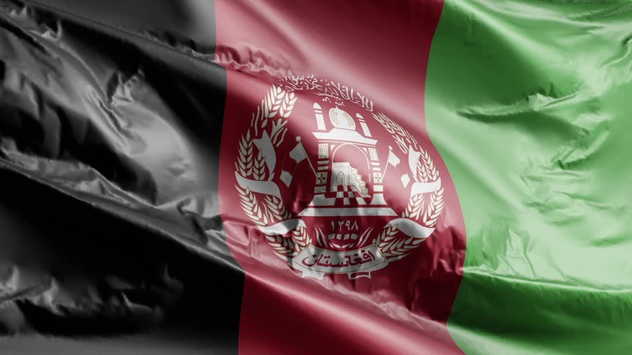 флаг афганистана, размахивающийся на ветровой петле. афганский флаг, качающийся на ветре. полный заполняющий фон. 10-секундная петля.