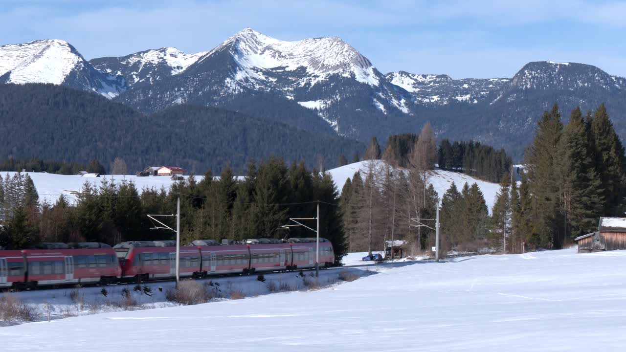 Train near Mittenwald with the Karwendel mountains as a background. Close perspective