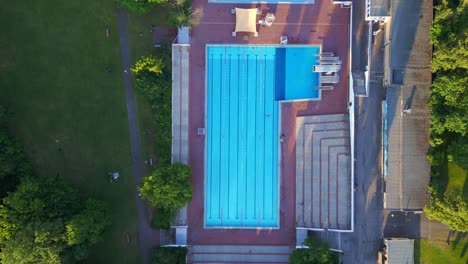 great aerial top view flight berlin city public swimming pool germany in europe, summer day 2023