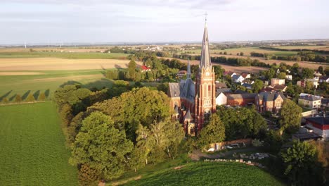 opava district, czech republic - the church of jana krtitele in sudice village - aerial drone shot