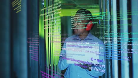 animation of data processing over african american male engineer using laptop at server room