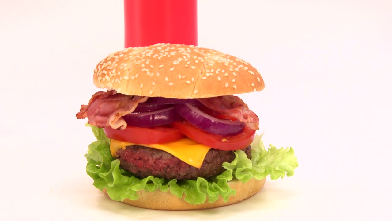 Creation of cheeseburger on white background