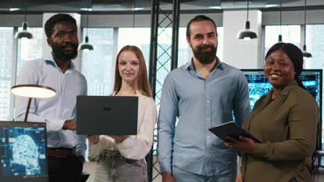 portrait of teamworking programmers in office developing apps using ai