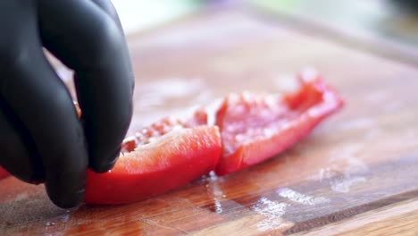 the art of cooking as a tomato meets the precision of a chef's knife on a quaint wooden table