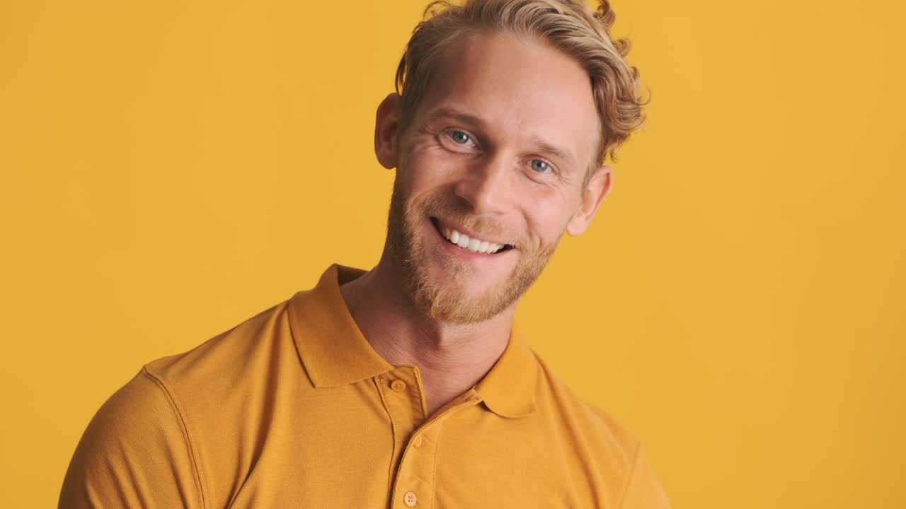 Cheerful bearded guy saying yes
