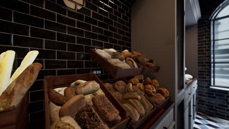 a bakery display of fresh bread loaves in wooden crates