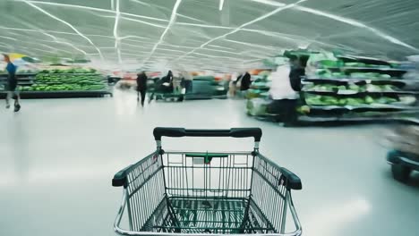 a view of the aisle in a busy supermarket