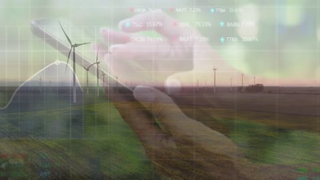 animación del procesamiento de datos financieros sobre una mujer caucásica usando un teléfono inteligente y una turbina eólica