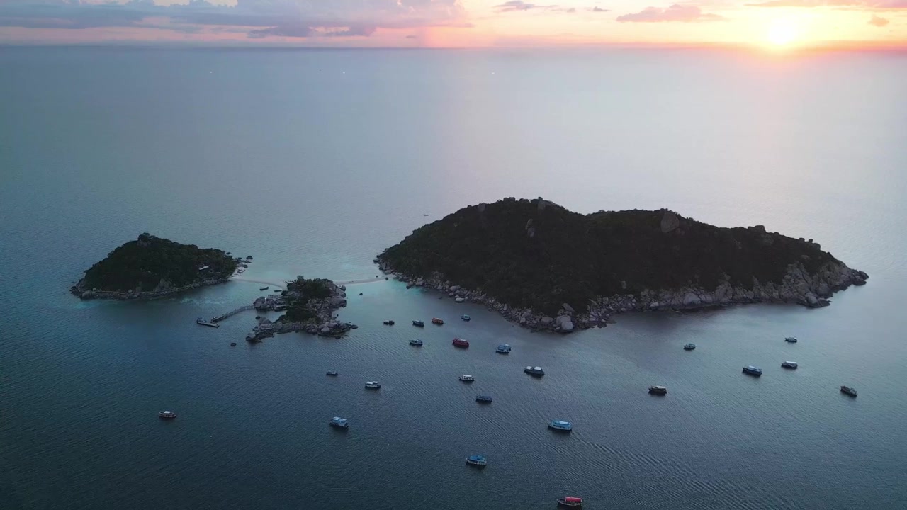 Aerial sunset of Nang Yuan Island, Koh Tao island in gulf of Thailand drone travel destination